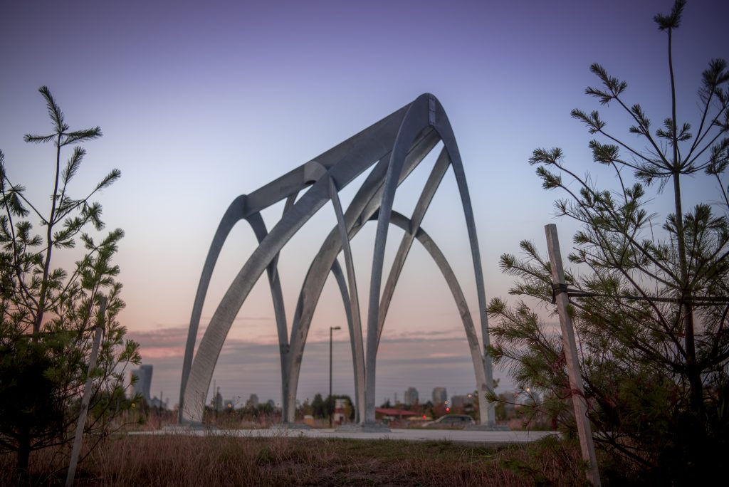Metal sculpture with three overlapping arches