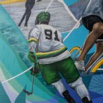 Sample of Tomken Arena mural with hockey player and skaker