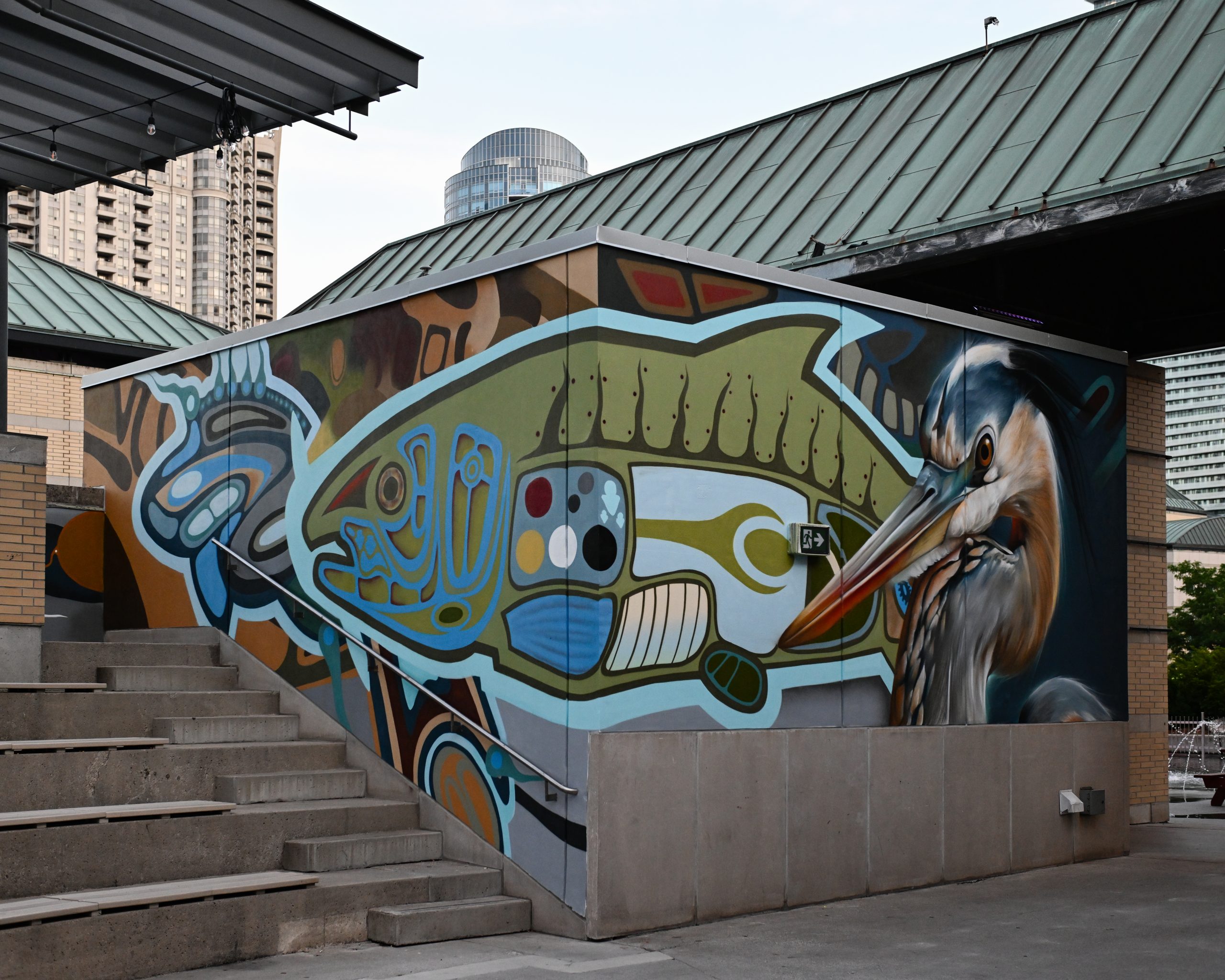 spray painted mural next to steps