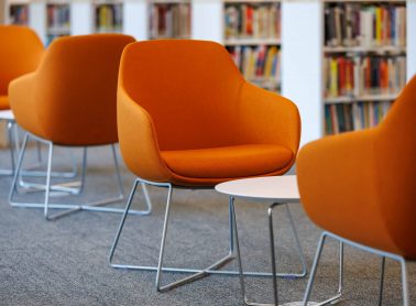 Orange chairs at the Hazel McCallion Central Library.