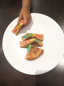 Grilled cheese sandwiches with food colouring