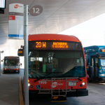 A bus waits at Platform 12 at the Kipling Bus Terminal.