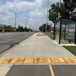 Stop #3107 - 2 metre standard 4-post shelter with MUT and tactile plates